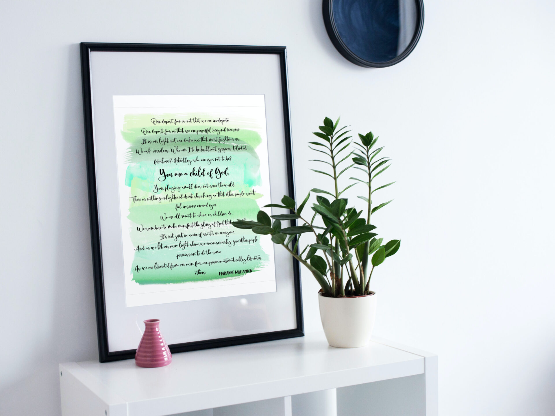 Green watercolor brushstroke background with the Marianne Williamson poem “Our Deepest Fear” hand lettered